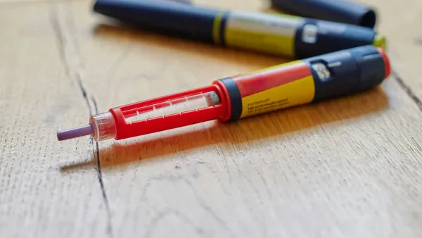 Red plastic insulin delivery pen